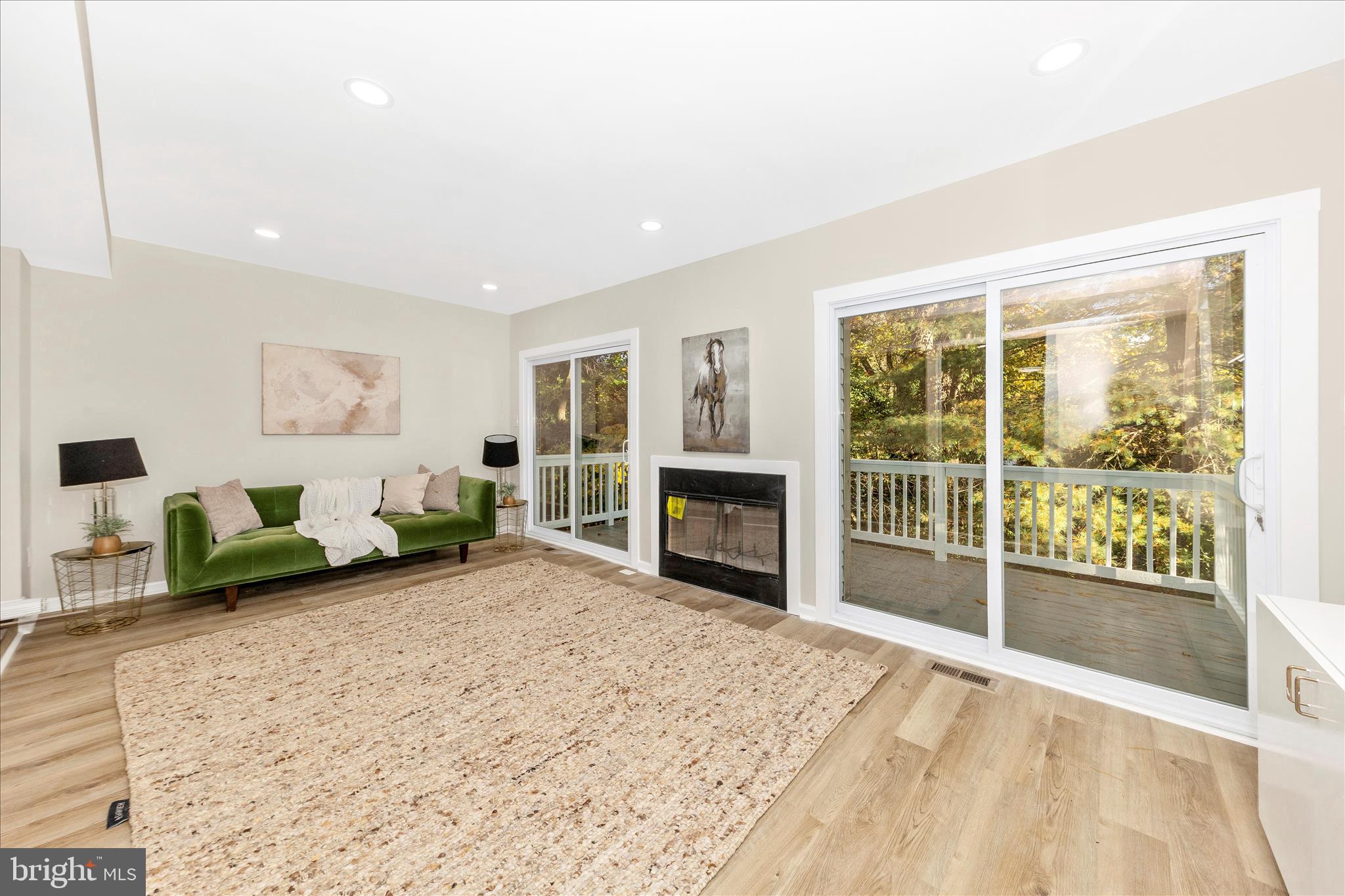 1 Kinsman View Circle Silver Spring, MD 20901 - Photo 11 of 52 a spacious bedroom with a bed and a couch