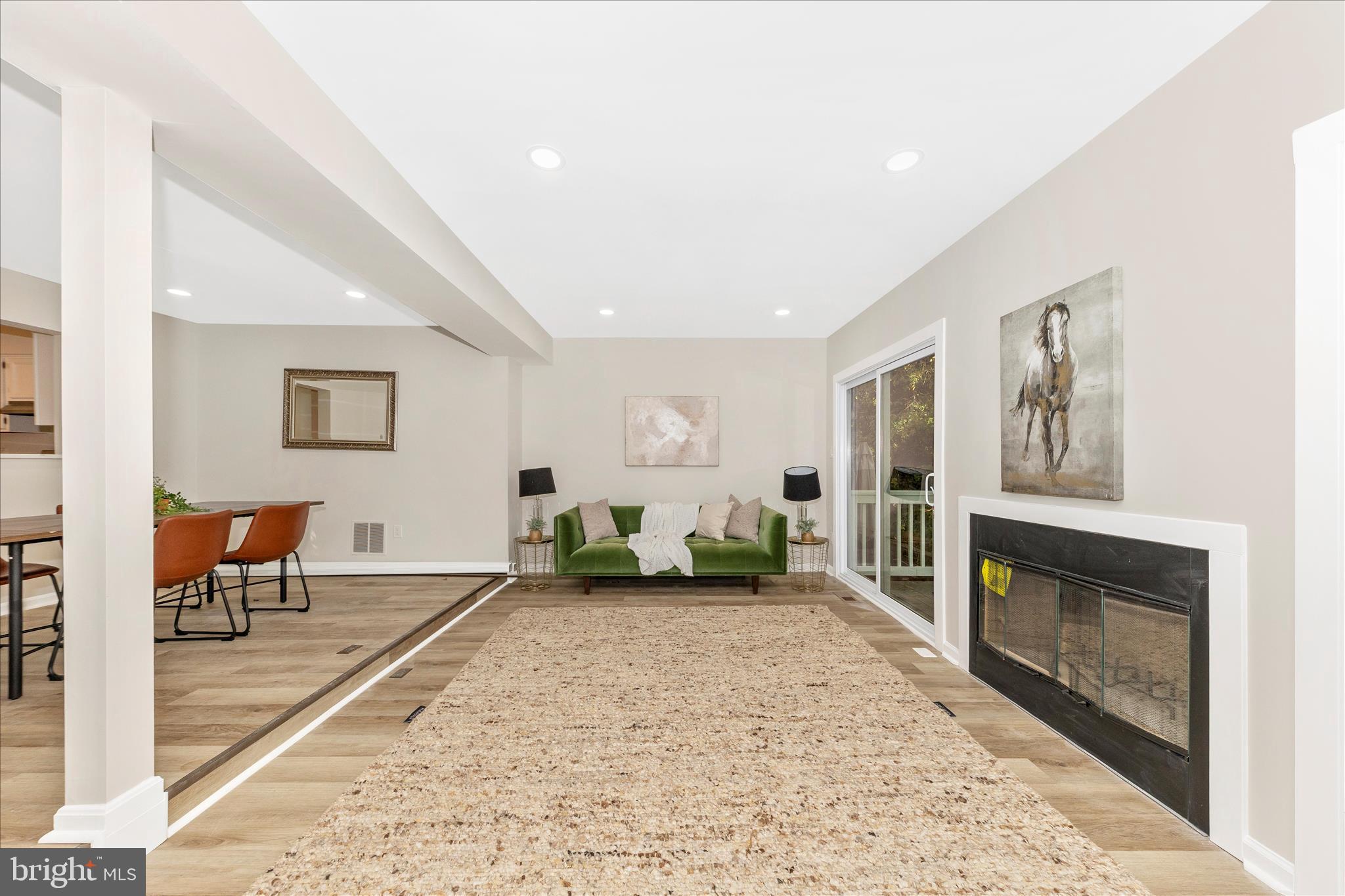 1 Kinsman View Circle Silver Spring, MD 20901 - Photo 12 of 52 a living room with furniture and a fireplace