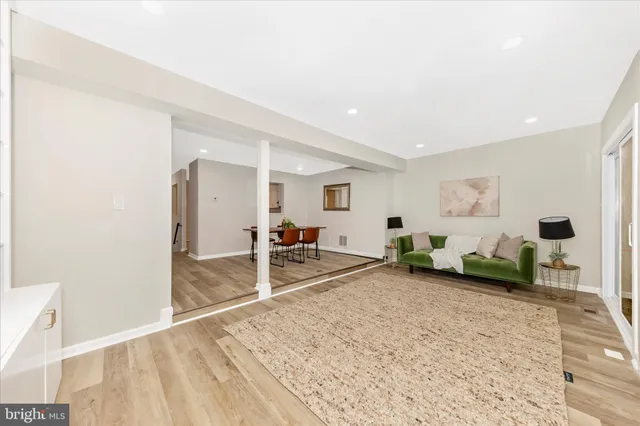 a view of a livingroom with furniture and a rug