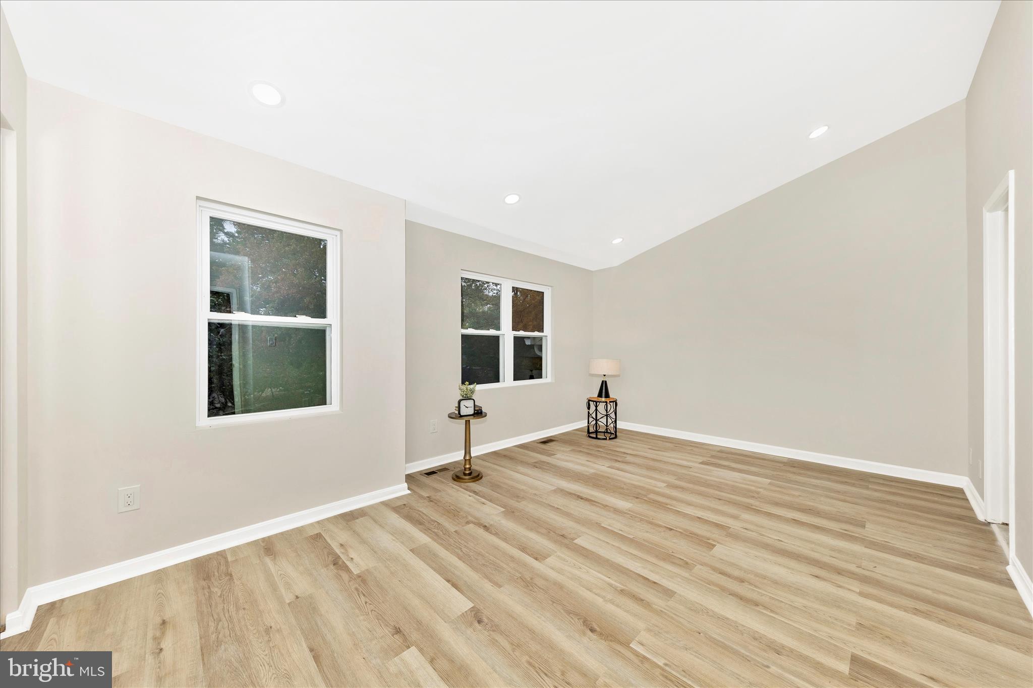 1 Kinsman View Circle Silver Spring, MD 20901 - Photo 28 of 52 an empty room with wooden floor and windows