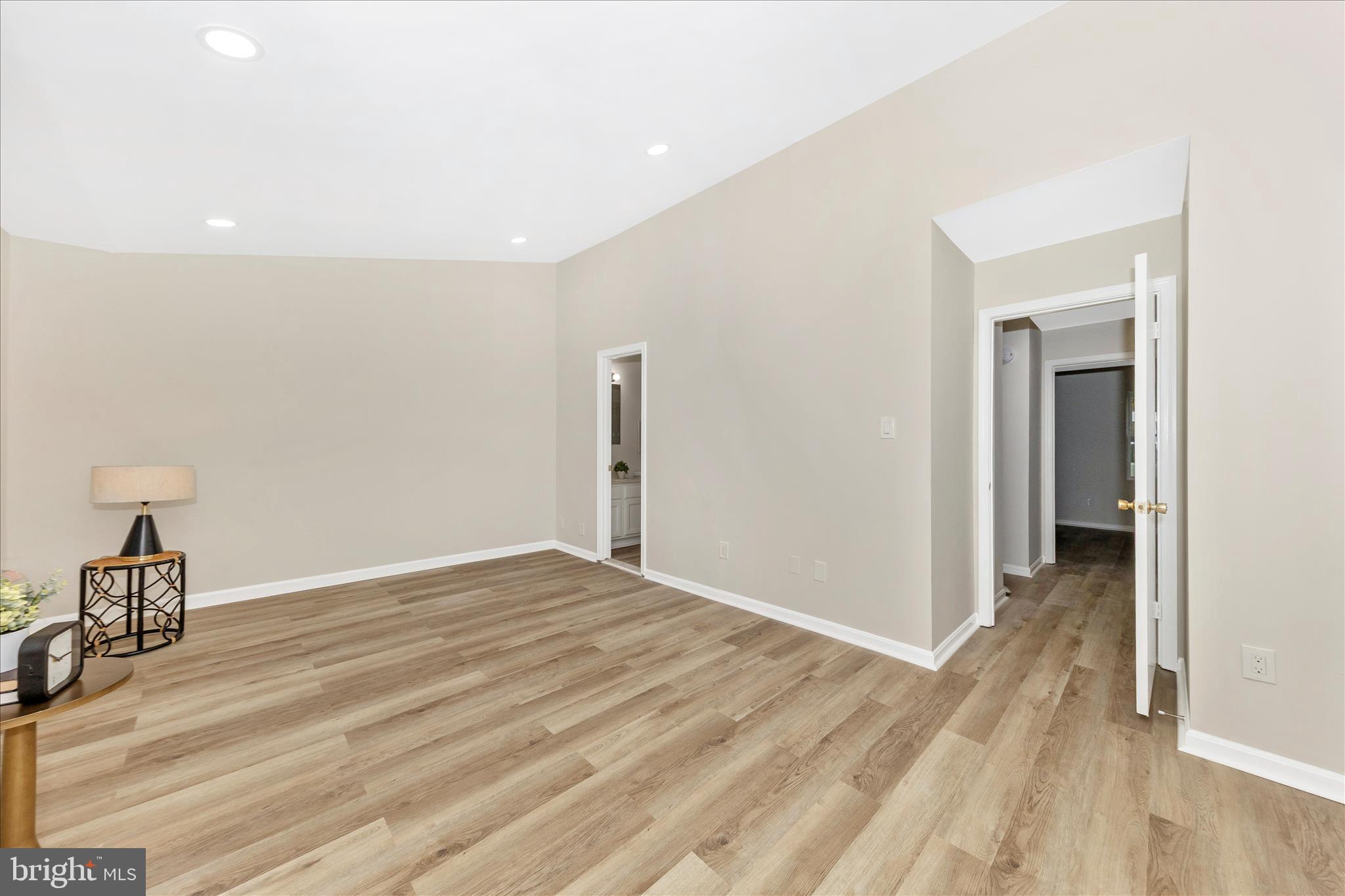 1 Kinsman View Circle Silver Spring, MD 20901 - Photo 30 of 52 a view of a livingroom with wooden floor