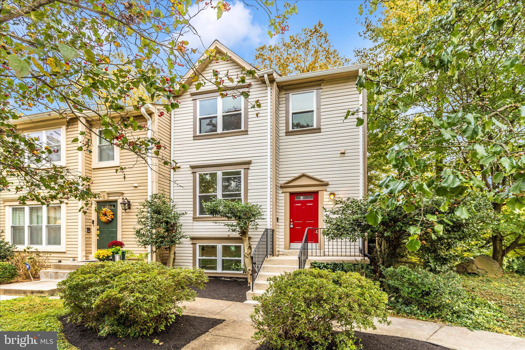 1 Kinsman View Circle Silver Spring, MD 20901 - Photo 40 of 52 a front view of a multi story residential apartment building with yard