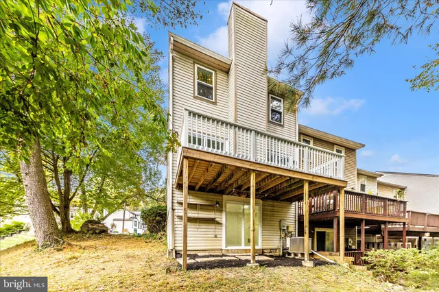a view of balcony with wooden floor
