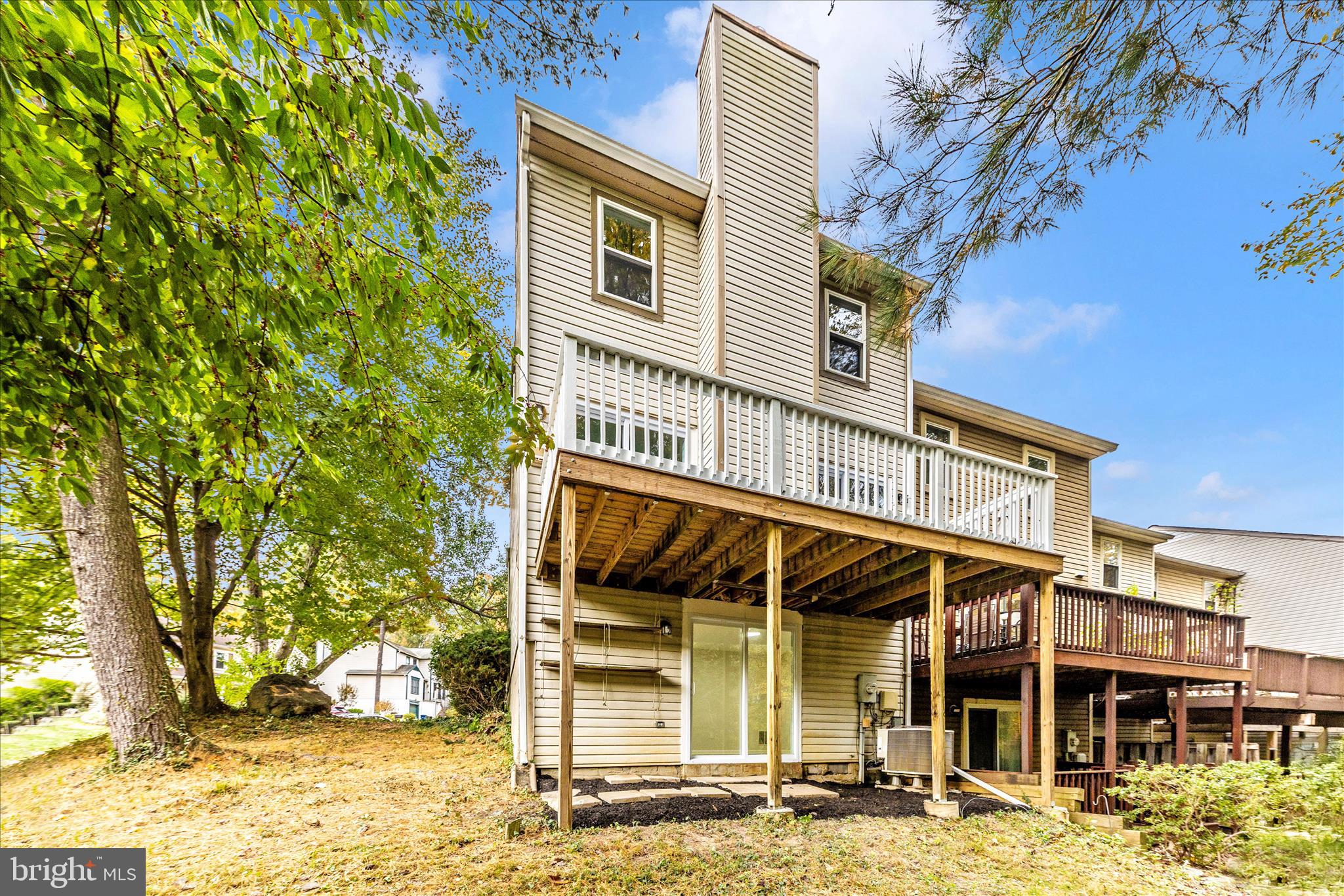 1 Kinsman View Circle Silver Spring, MD 20901 - Photo 46 of 52 front view of a building with a tree