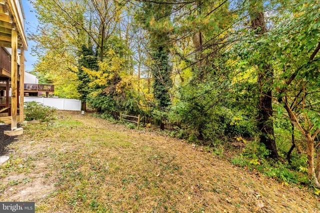 a view of a balcony with two chairs