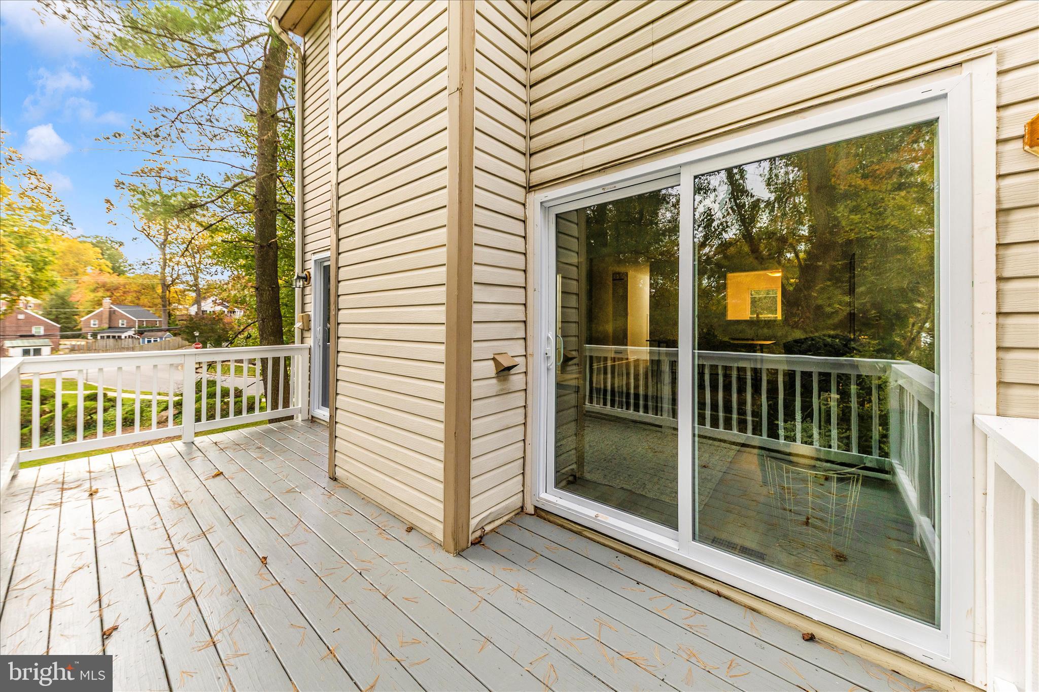 1 Kinsman View Circle Silver Spring, MD 20901 - Photo 50 of 52 a view of a balcony with wooden floor