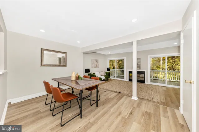 a view of a livingroom with furniture and wooden floor