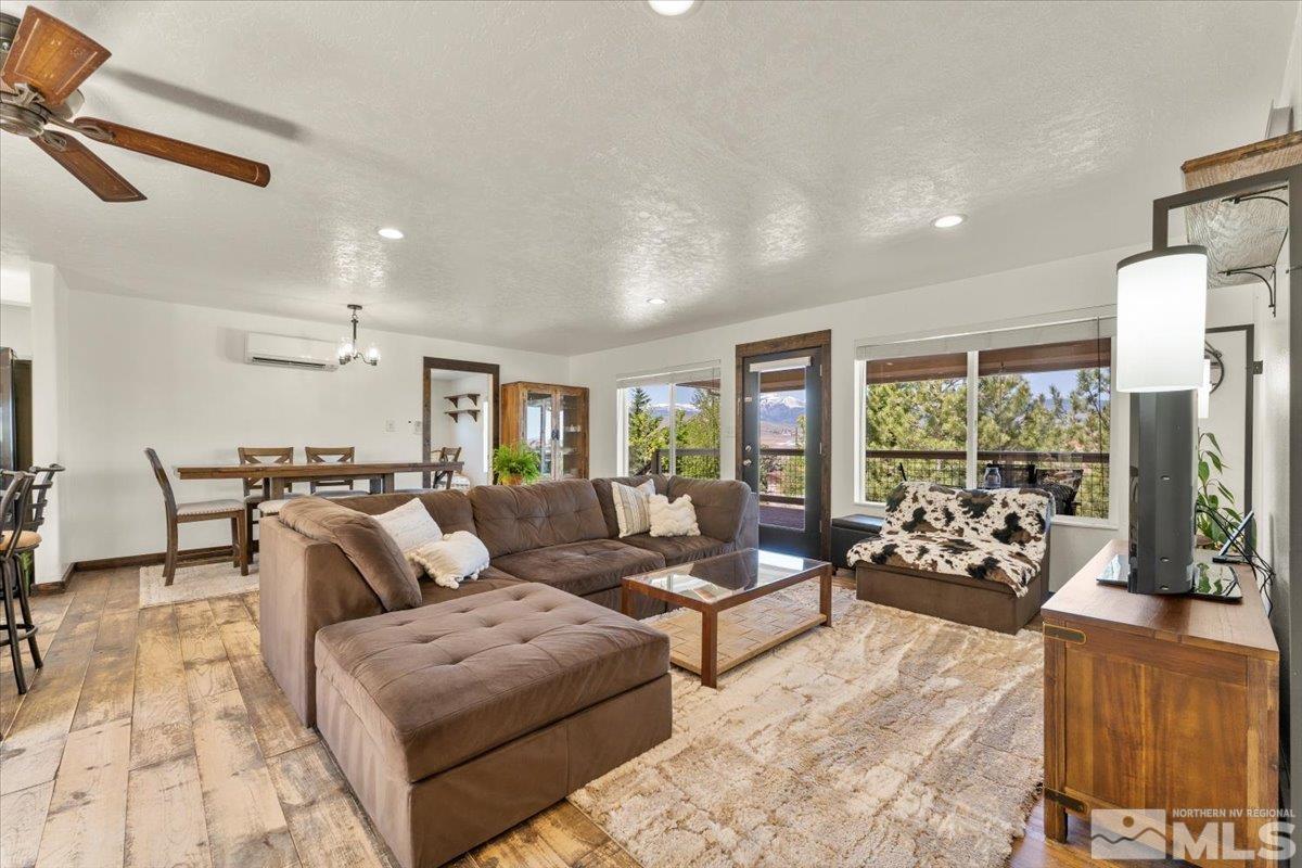 1950 Geiger Grade Road Reno, NV 89521 - Photo 8 of 32 a living room with furniture and large windows