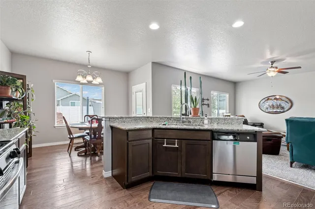 a view of a kitchen and dining table