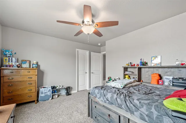 a close view of laundry room with racks on the wall