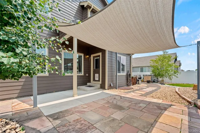a house view with a garden space