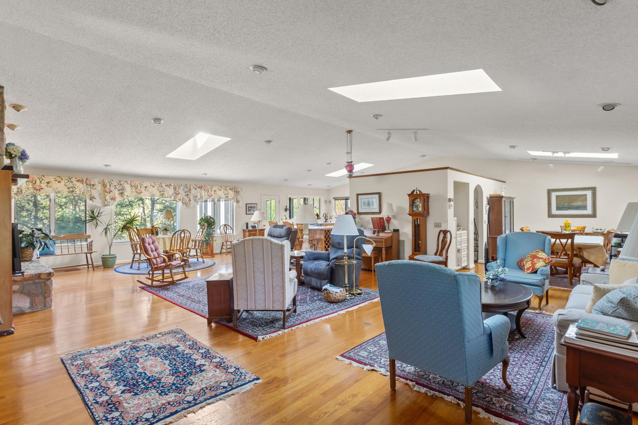 13004 Indian Trail Road Broadway, VA 22815 - Photo 6 of 56 a living room with furniture and a table