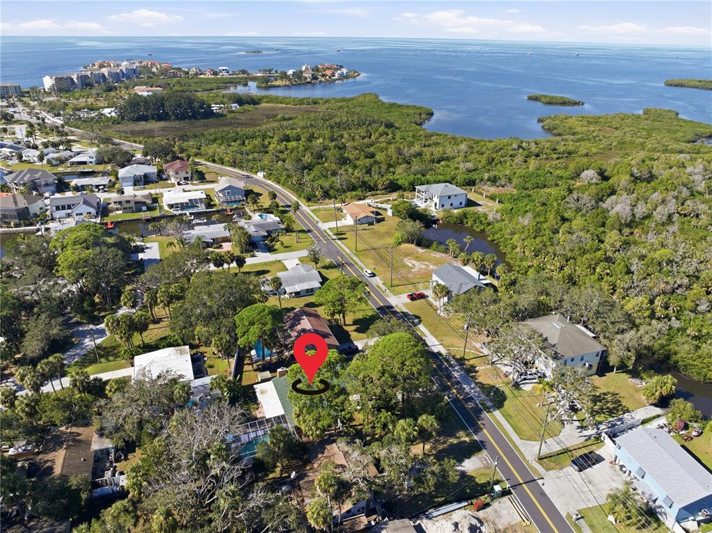 5122 Bay Boulevard Port Richey, FL 34668 - Photo 25 of 56 an aerial view of residential houses with outdoor space