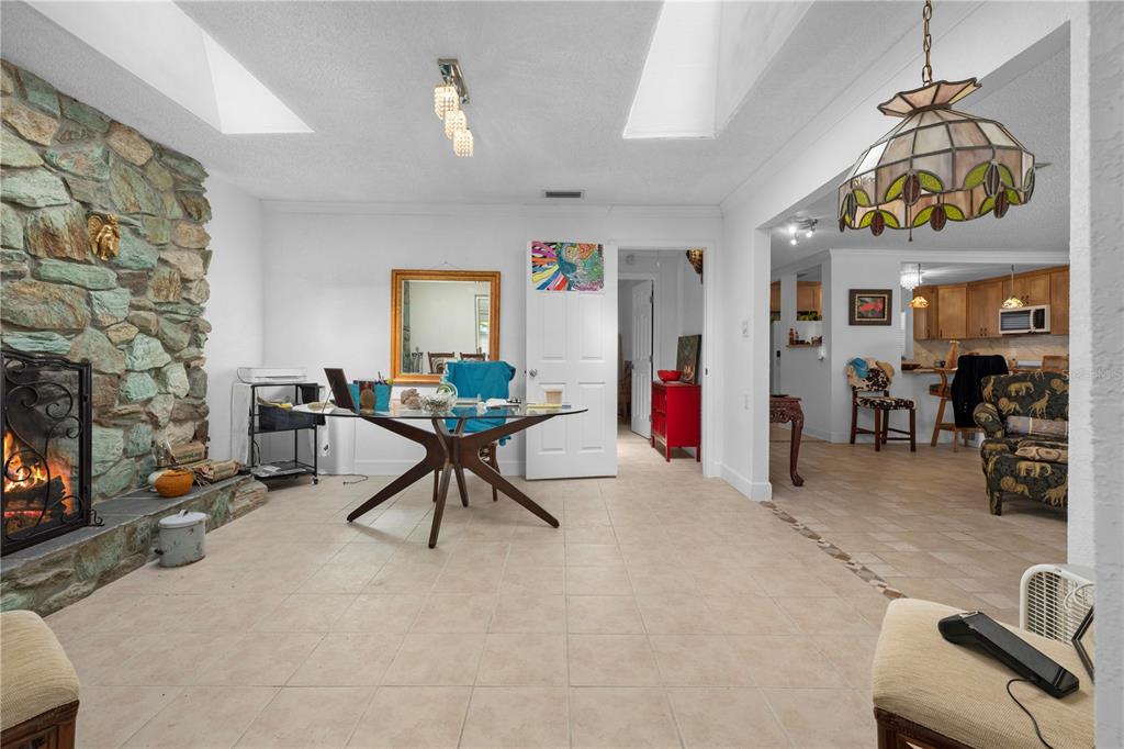 5122 Bay Boulevard Port Richey, FL 34668 - Photo 31 of 56 a living room with furniture and a flat screen tv