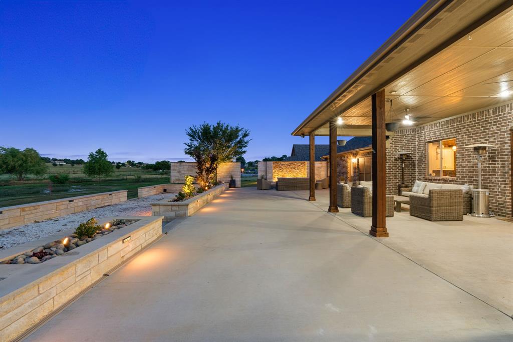12190 Marion Road Sanger, TX 76266 - Photo 34 of 39 a view of a swimming pool with a patio