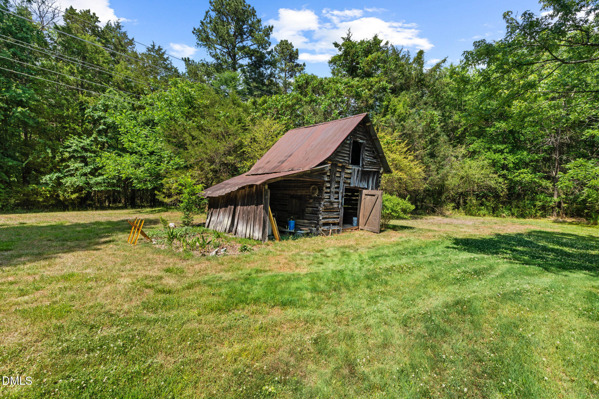 3415 Mt Willing Road Efland, NC 27243 - Photo 24 of 36 a view of a house with a yard