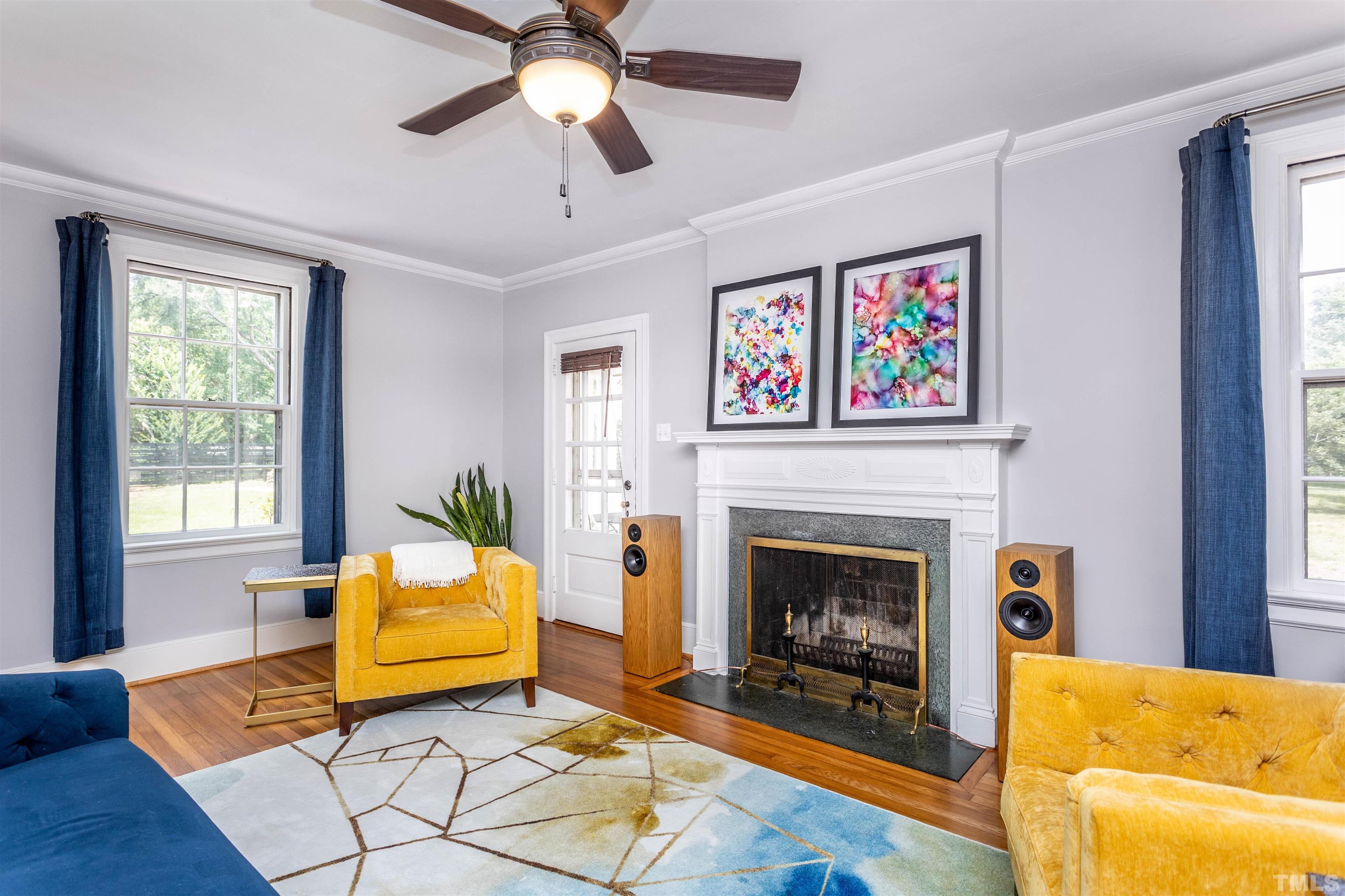 2019 New Bern Avenue Raleigh, NC 27610 - Photo 8 of 37 a living room with furniture and a fireplace