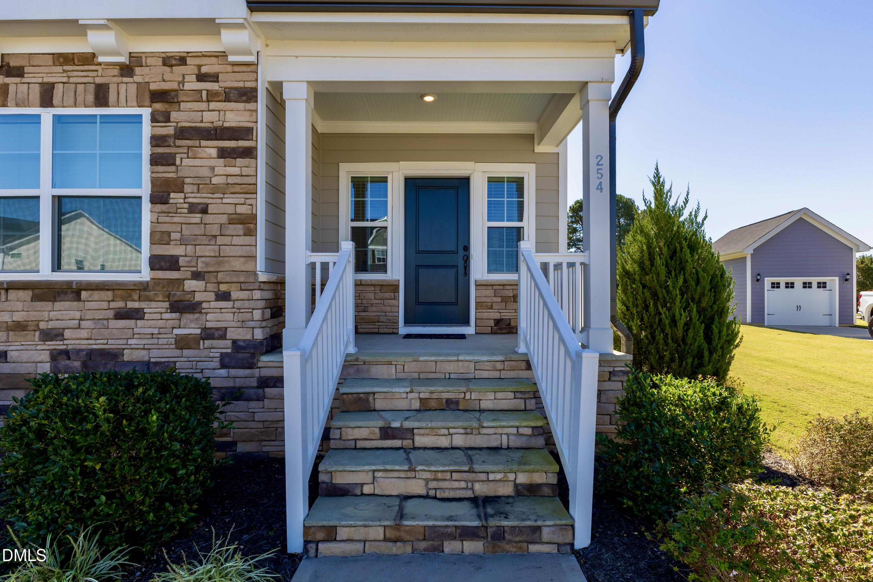 254 Dungannon Loop Clayton, NC 27520 - Photo 9 of 53 Front Porch