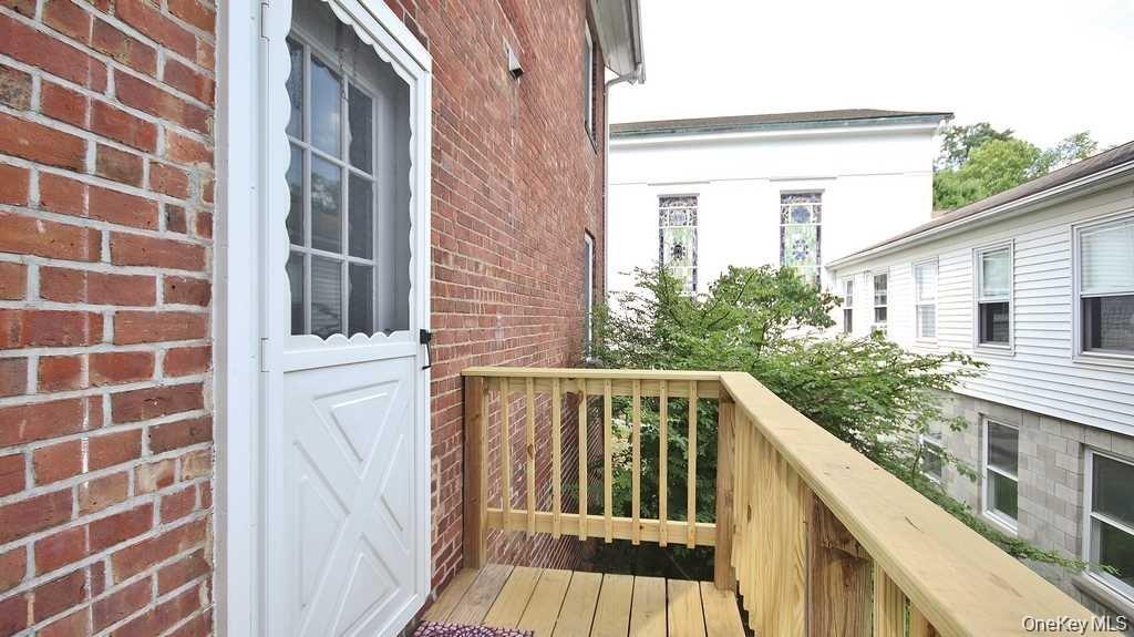 40 Broad Street Fishkill, NY 12524 - Photo 23 of 23 a view of a brick buildings from a balcony