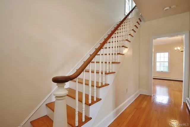 a view of entryway with wooden floor