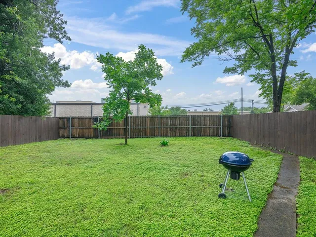 a view of a garden with a bench