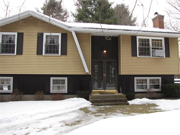 31 Wilbraham Road Hampden, MA 01036 - Photo 1 of 19 a view of a house with a yard covered in snow