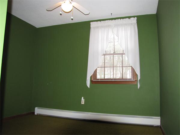 31 Wilbraham Road Hampden, MA 01036 - Photo 10 of 19 a view of a room with a window and a ceiling fan