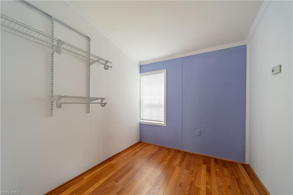 433 Riviera Boulevard West Naples, FL 34112 - Photo 20 of 30 a view of empty room with windows