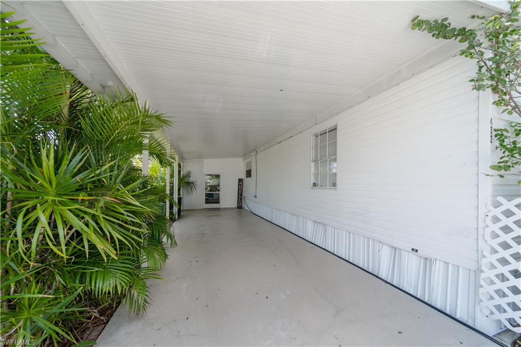 433 Riviera Boulevard West Naples, FL 34112 - Photo 22 of 30 a view of a backyard