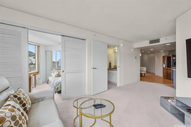 a living room with furniture and a table
