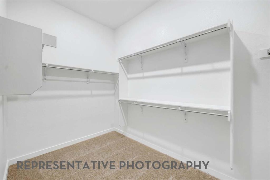 8715 Wildberry Road Oak Point, TX 75068 - Photo 15 of 23 a view of an empty room