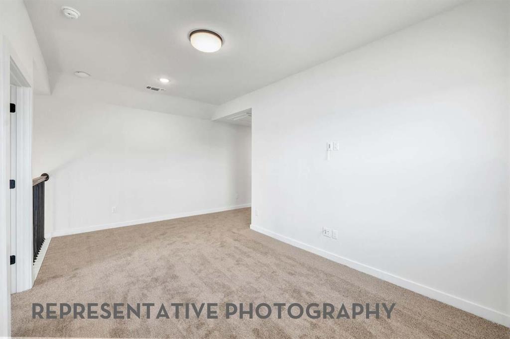 8715 Wildberry Road Oak Point, TX 75068 - Photo 17 of 23 a view of an empty room
