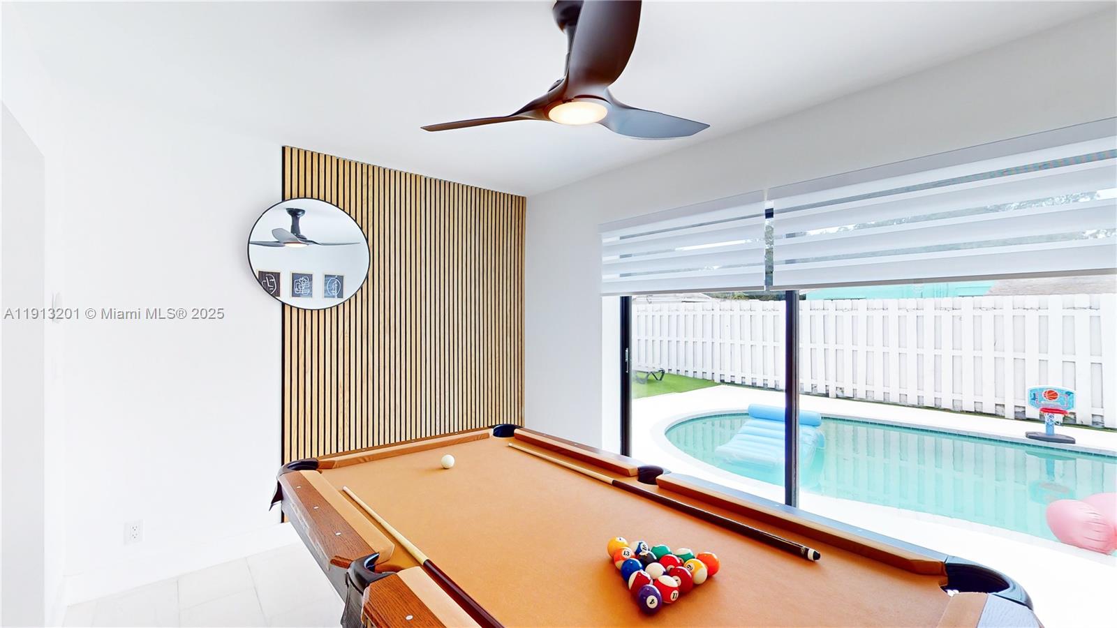 6630 Cody Street Hollywood, FL 33024 - Photo 20 of 45 a room with furniture and window