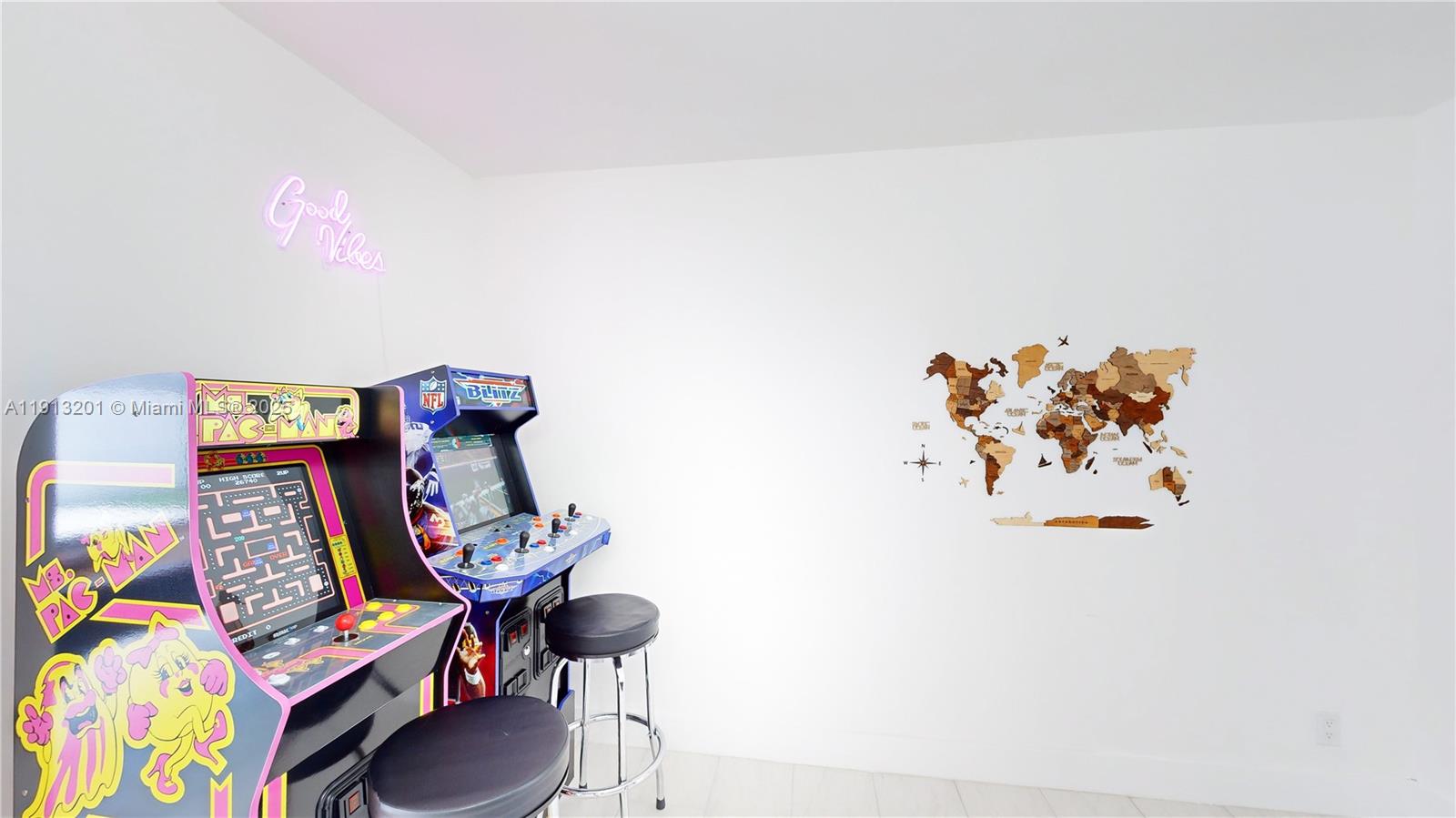 6630 Cody Street Hollywood, FL 33024 - Photo 31 of 45 a cabinet with rug and painting on the wall