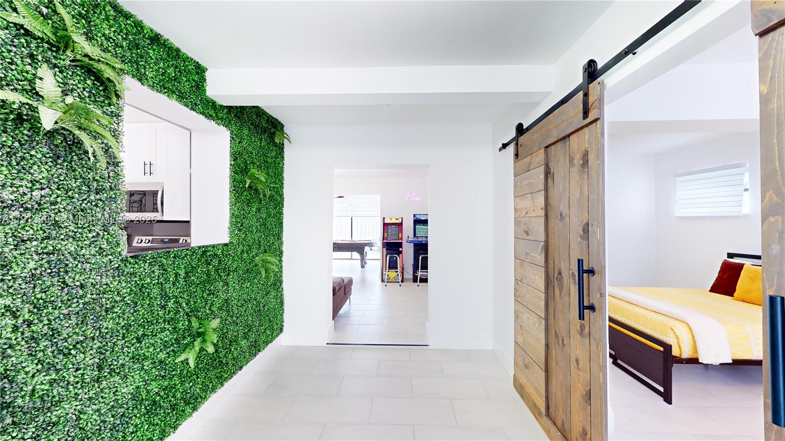 6630 Cody Street Hollywood, FL 33024 - Photo 34 of 45 a view of a bedroom from a corridor