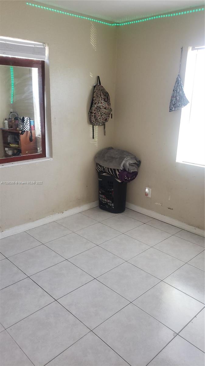 559 Dogwood Road West Palm Beach, FL 33409 - Photo 3 of 7 a room with a window