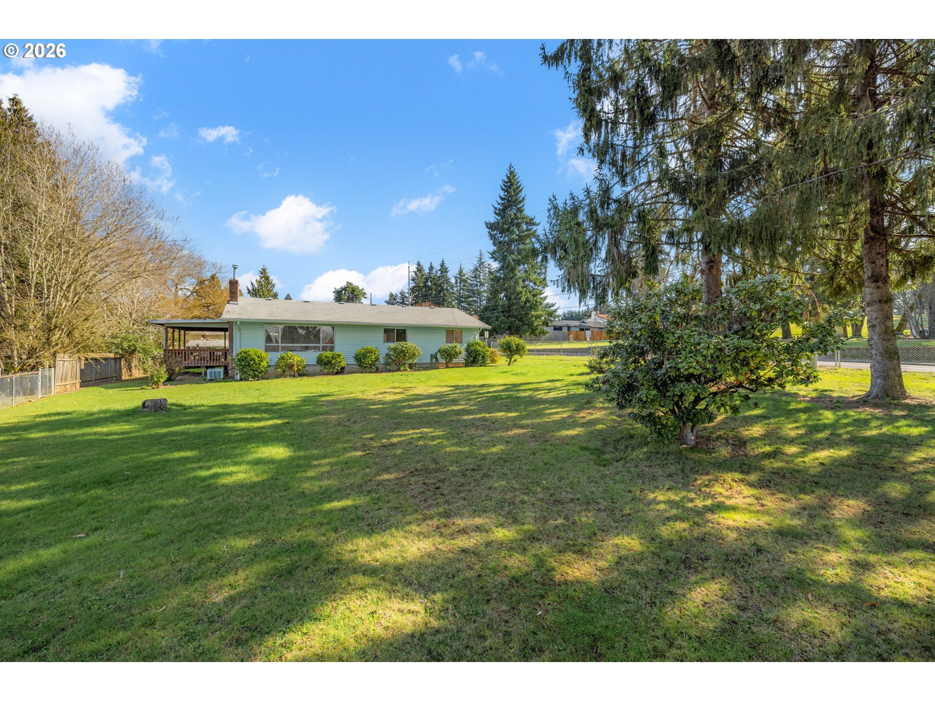 9025 Southwest Avery Street Tualatin, OR 97062 - Photo 34 of 35 a view of a big yard with large trees