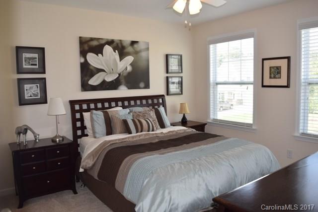 8067 Bryson Road Indian Land, SC 29707 - Photo 14 of 22 a bedroom with a bed and a window