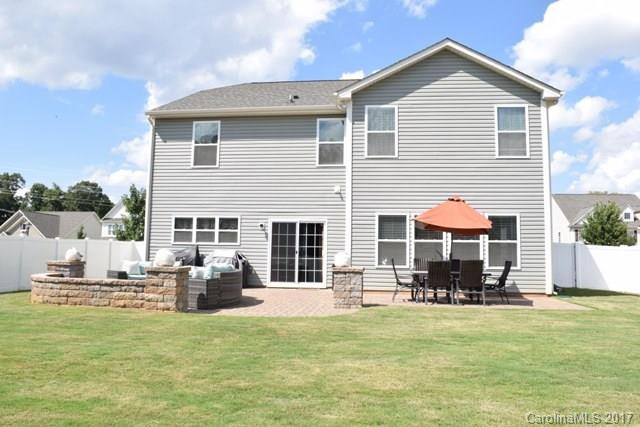 8067 Bryson Road Indian Land, SC 29707 - Photo 22 of 22 a view of a chair and tables in the patio