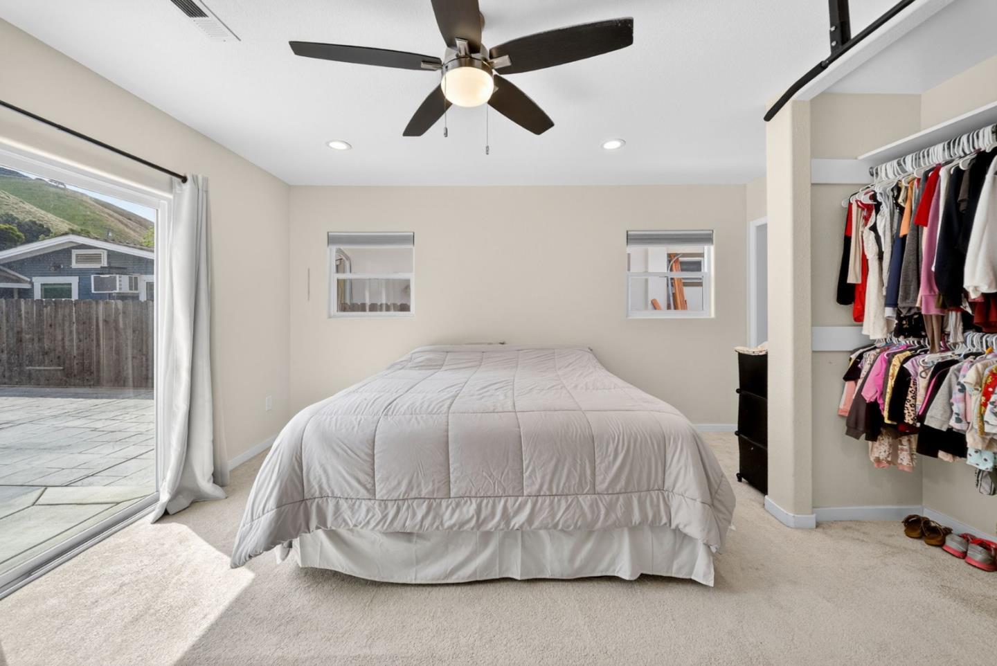919 Old Canyon Road Fremont, CA 94536 - Photo 16 of 55 a bedroom with a bed and a walk in closet