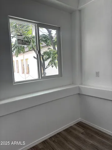 a view of a room that has a window