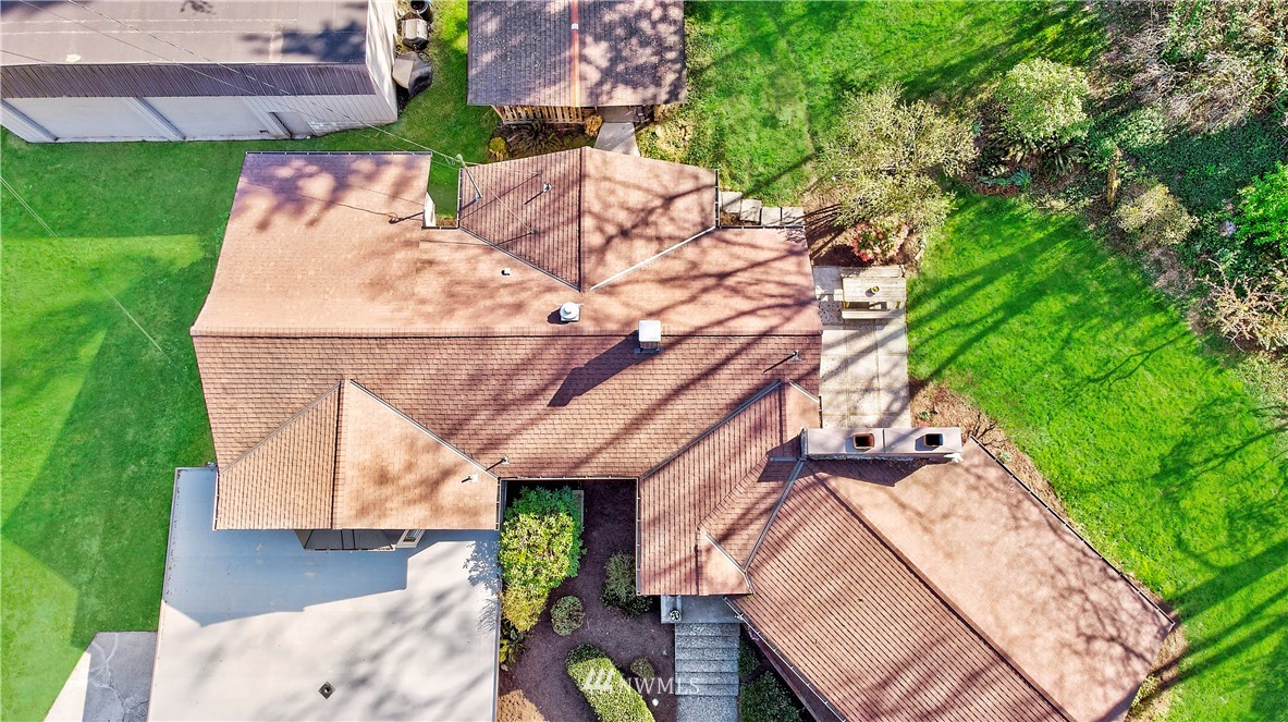 16919 112th Place Northeast Bothell, WA 98011 - Photo 2 of 40 an aerial view of a house with a yard basket ball court and outdoor seating