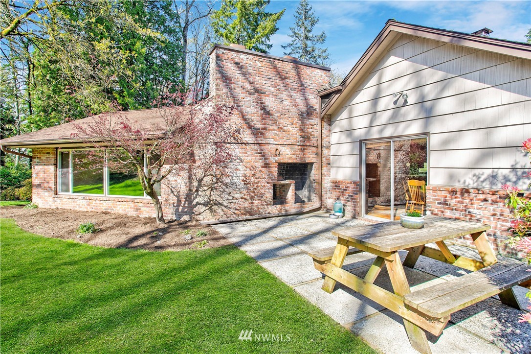 16919 112th Place Northeast Bothell, WA 98011 - Photo 24 of 40 a view of house with backyard porch and patio