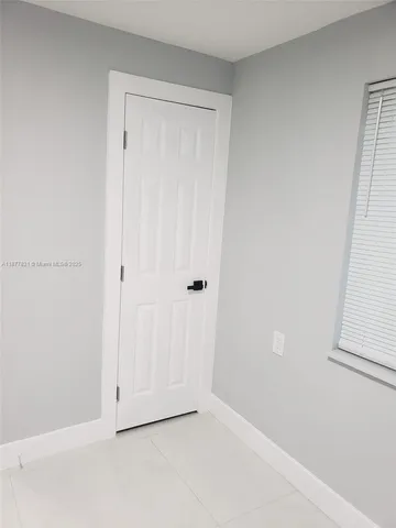 an aerial view of house with yard