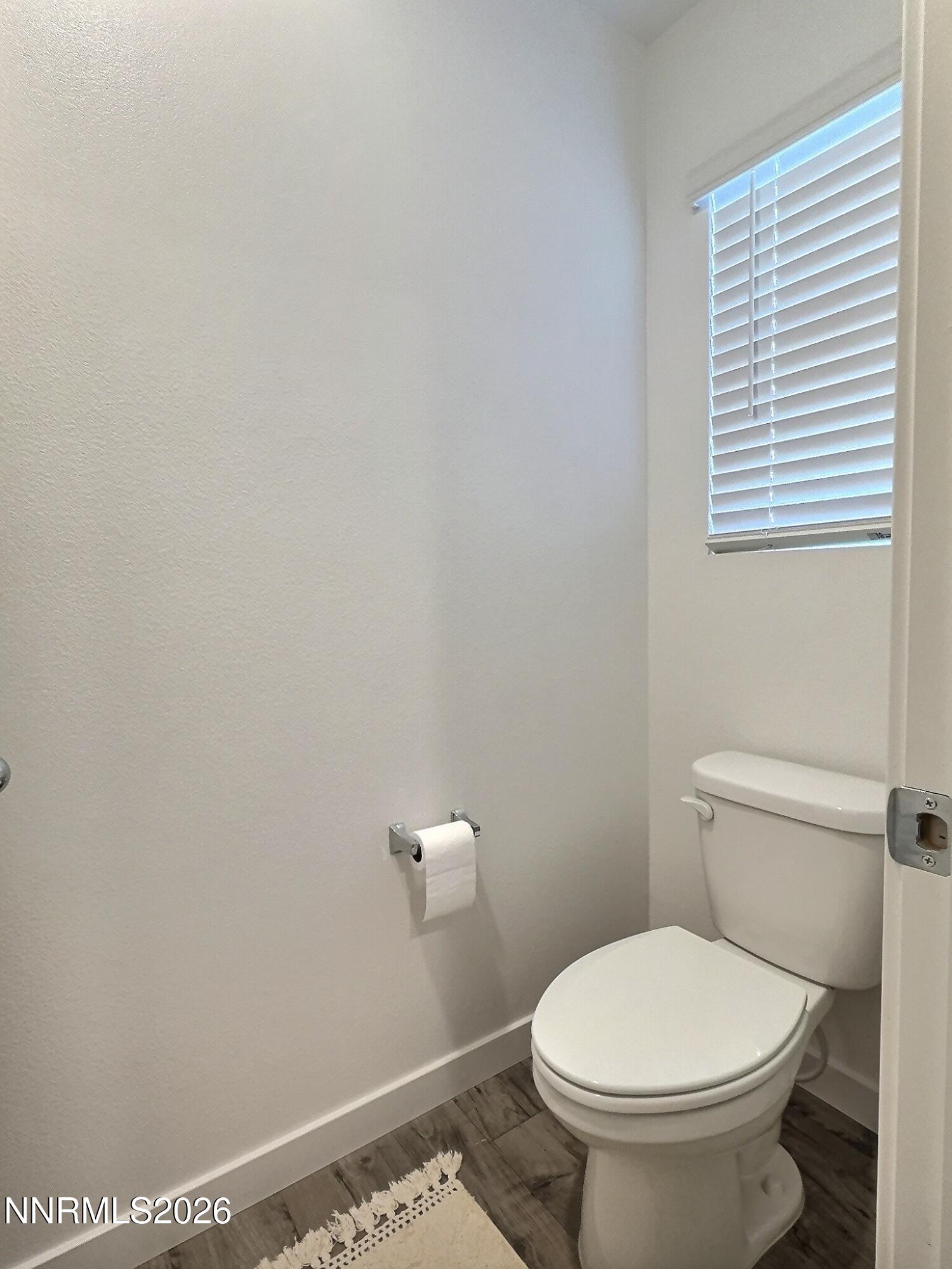 641 Pleasant Vista Drive Reno, NV 89506 - Photo 20 of 30 a white toilet sitting next to a white sink