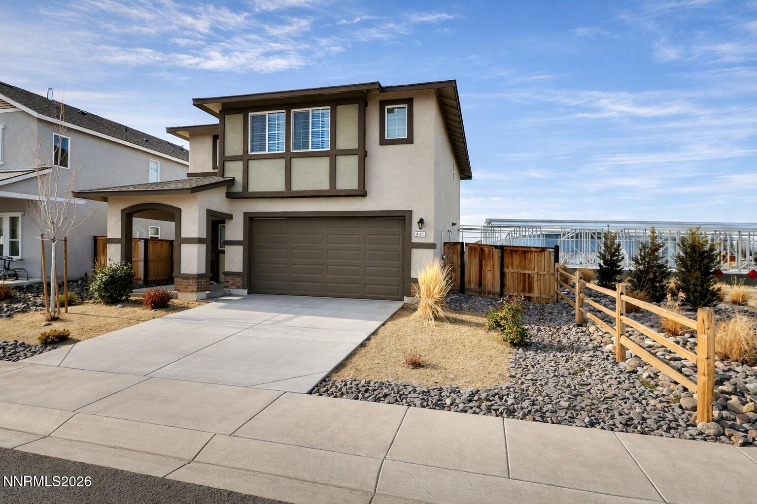 641 Pleasant Vista Drive Reno, NV 89506 - Photo 2 of 30 a front view of a house with a yard