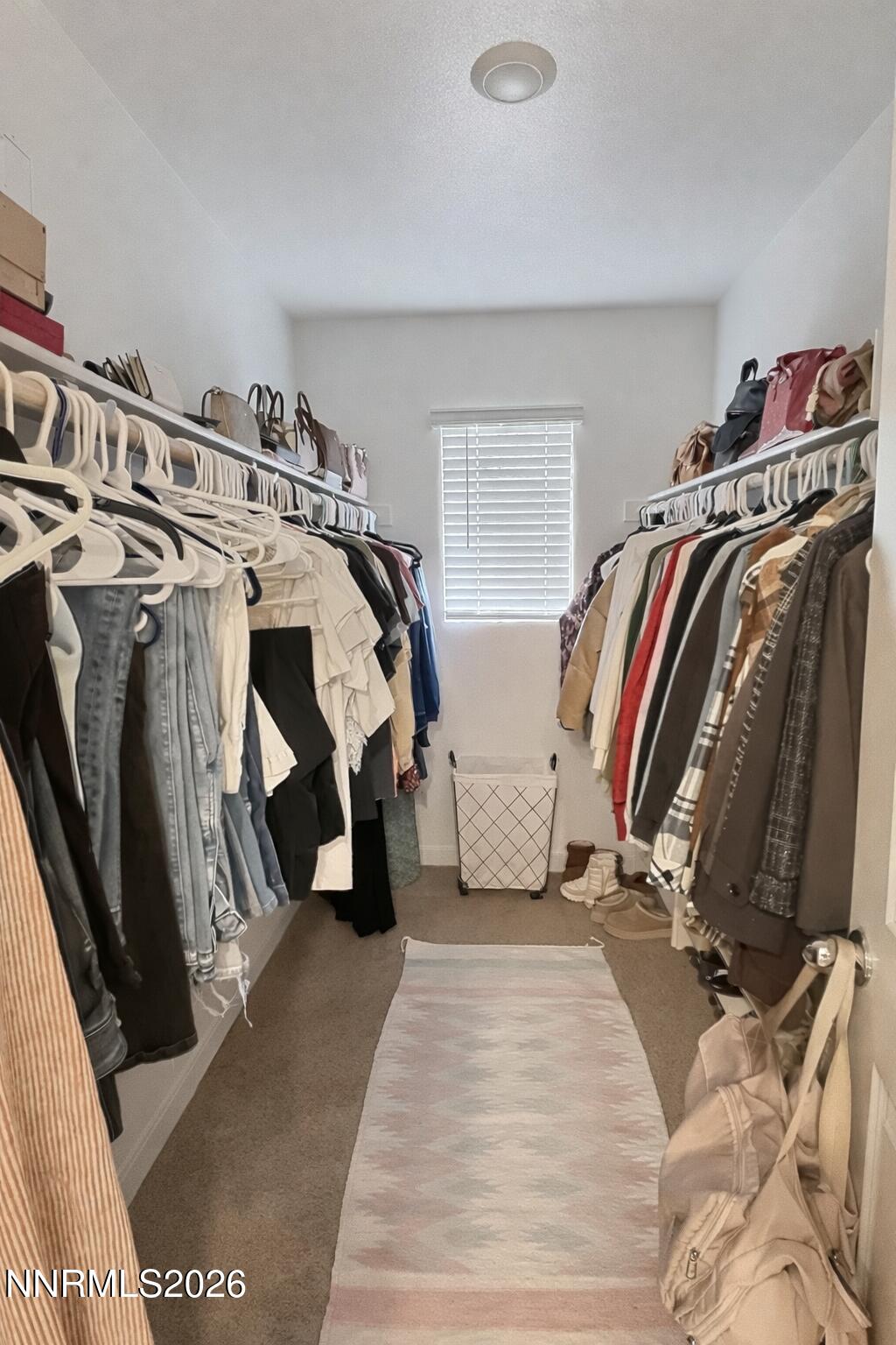 641 Pleasant Vista Drive Reno, NV 89506 - Photo 21 of 30 a view of walk in closet with clothes and shoes