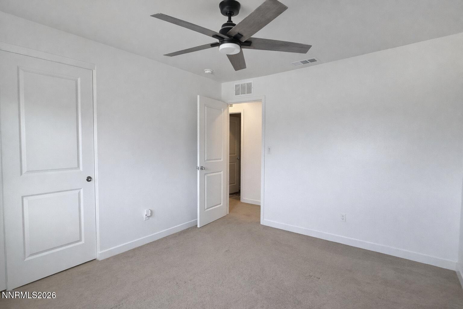 641 Pleasant Vista Drive Reno, NV 89506 - Photo 23 of 30 a view of an empty room and a ceiling fan