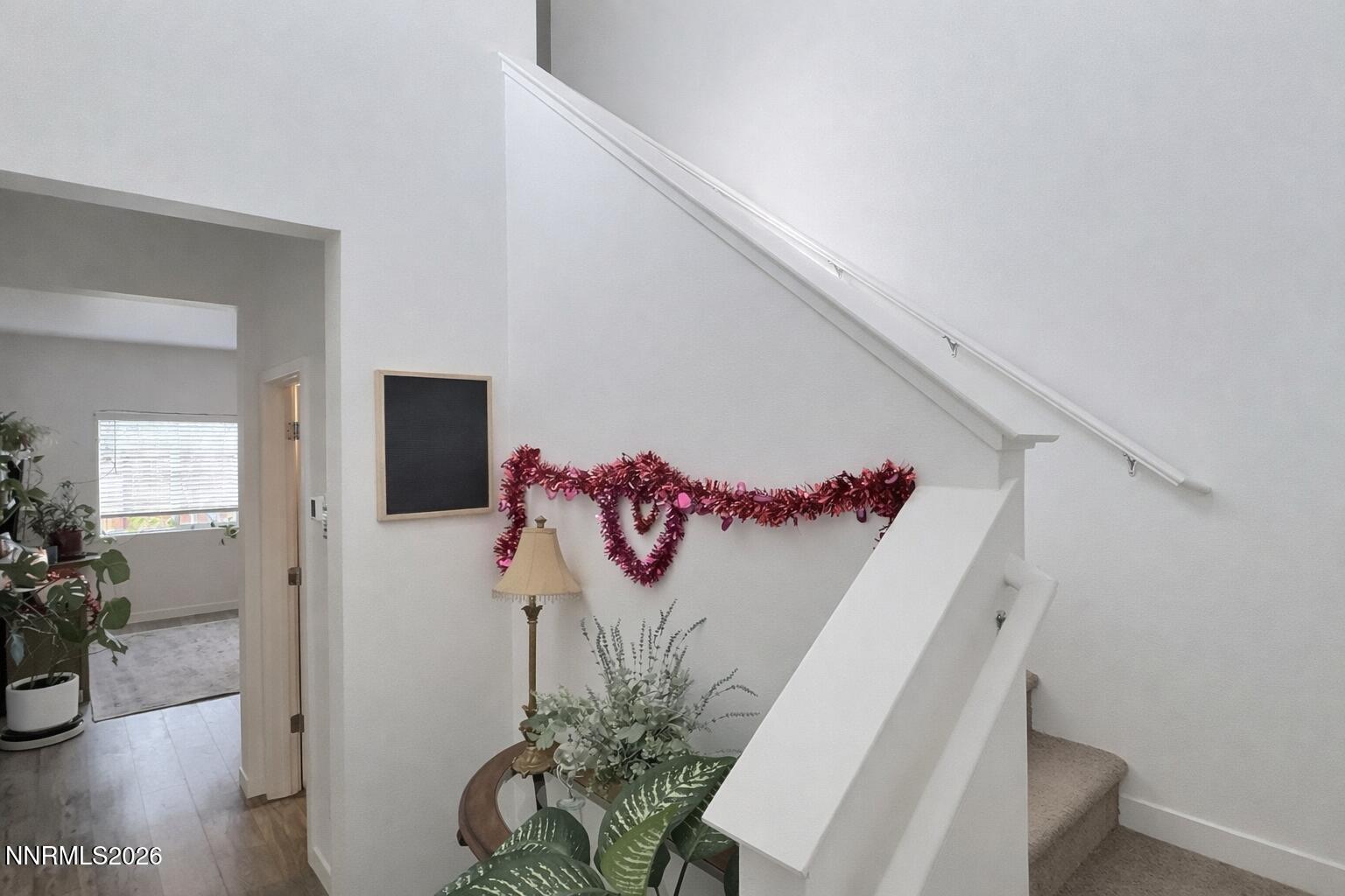 641 Pleasant Vista Drive Reno, NV 89506 - Photo 6 of 30 a view of a hallway with furniture and wooden floor