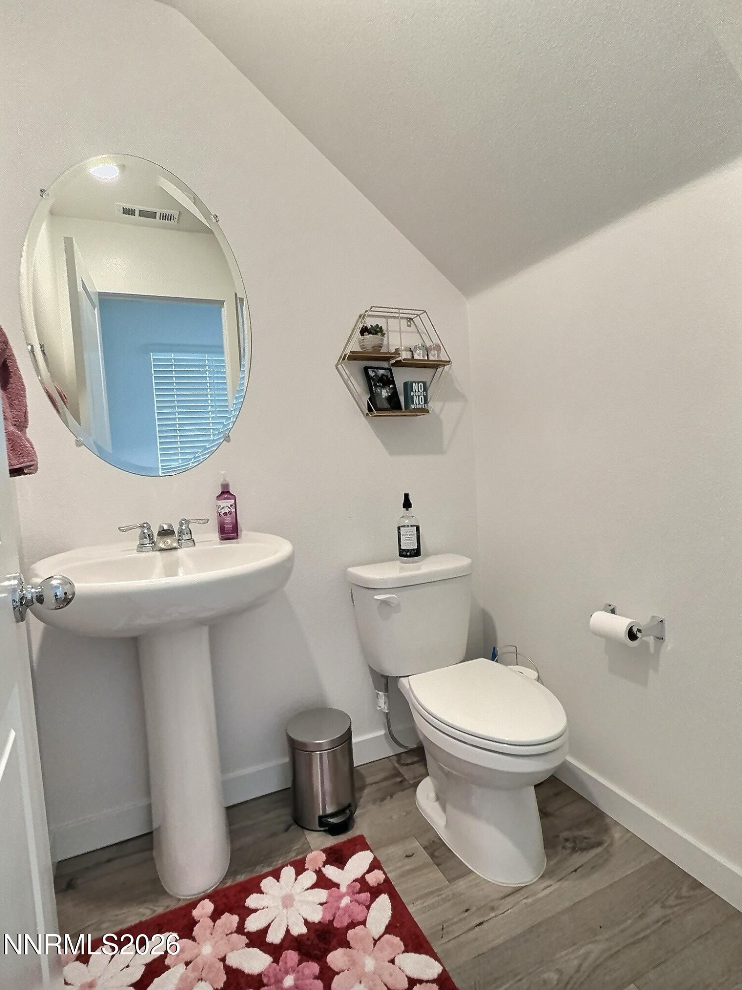 641 Pleasant Vista Drive Reno, NV 89506 - Photo 7 of 30 a bathroom with a sink toilet and mirror
